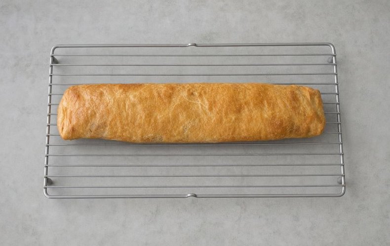 Apple Strudel, step 13: the strudel cooling before slicing