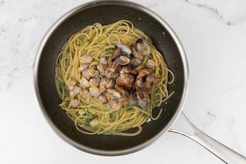 Clams and parsley tossed with the spaghetti