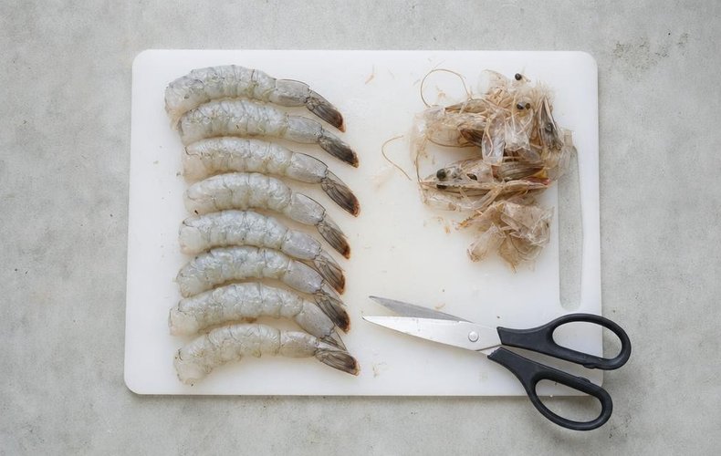 Spicy Shrimp Skewers, step 1: removing the head and shell from the jumbo shrimp
