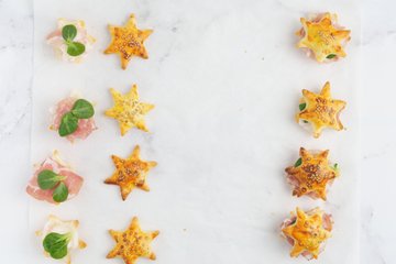 Covering the filling with the top halves of the stars