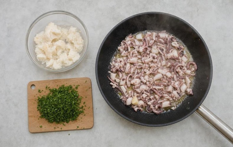 Stuffed squid, step 2: the chopped tentacles cooking in a skillet