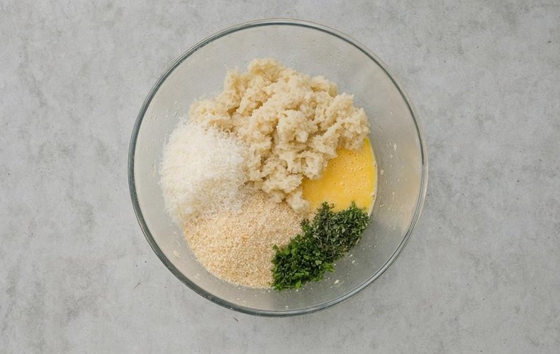 Stuffed Veal Roast, step 1: bread, egg, cheese and herb filling in a bowl