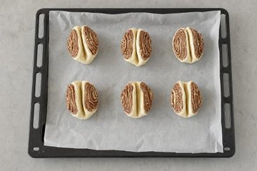 Super Quick Nutella Brioches, step 4: brioches on a lined baking sheet