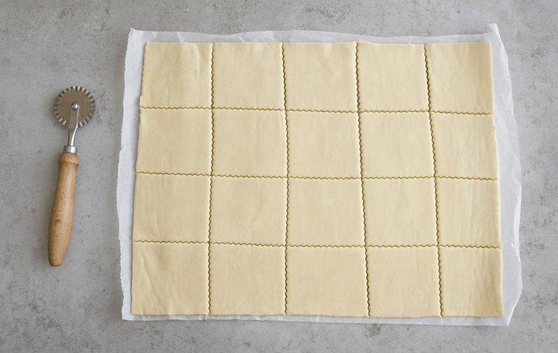 Sweet puff pastry pinwheels, step 1: cutting the pastry into squares