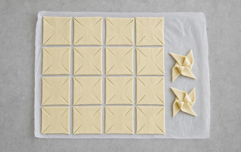 Sweet puff pastry pinwheels, step 2: cutting and folding the corners
