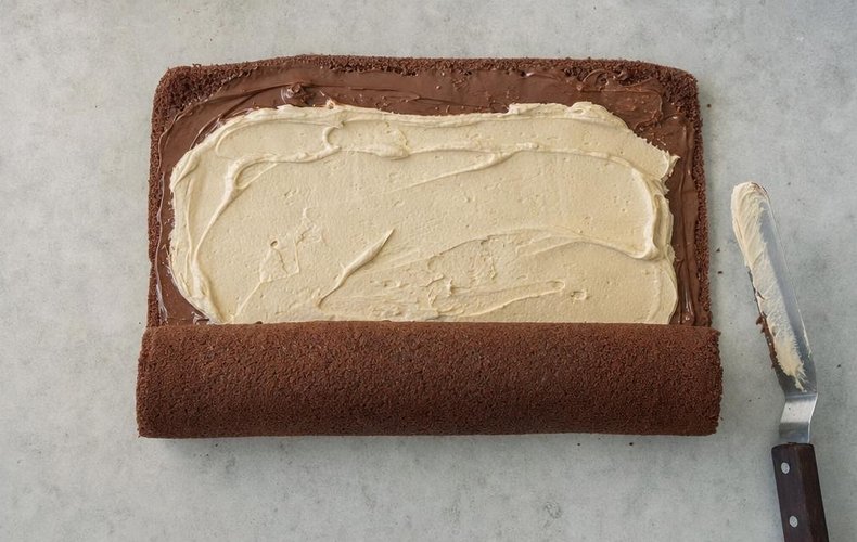Tiramisu and Nutella Yule Log, step 6: the sponge spread with Nutella and coffee cream