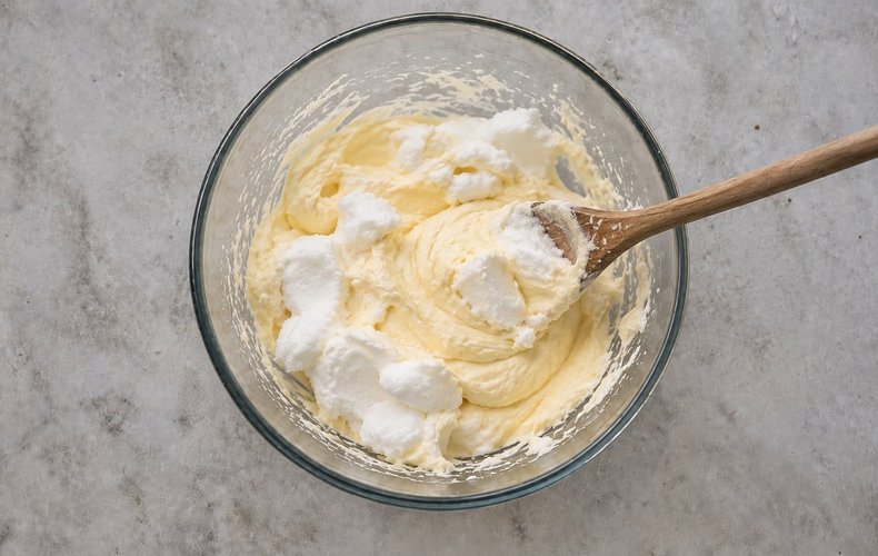 Tiramisu with Cantucci, step 3: folding the egg whites into the mascarpone cream