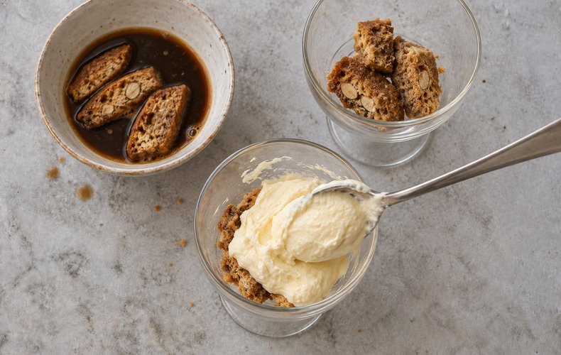 Tiramisu with Cantucci, step 5: coffee-soaked cantucci and mascarpone cream layered in a cup