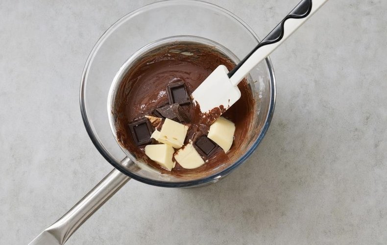 Torta Caprese, step 2: chocolate and butter melting in a double boiler