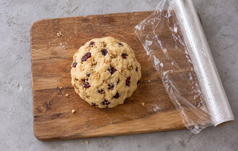Walnut and Blueberry Cookies, step 3: smooth ball of cookie dough on the work surface
