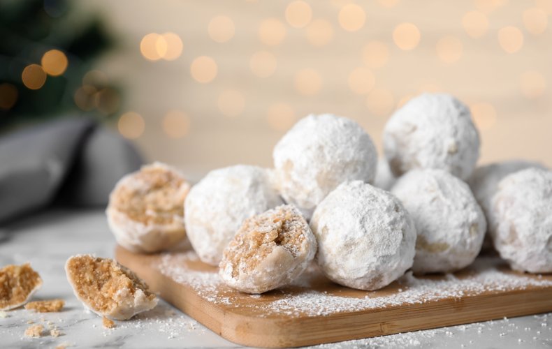 Walnut snowball cookies covered in powdered sugar