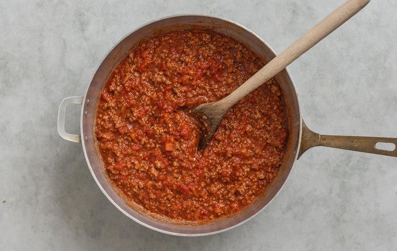 Ziti Lasagna, step 2: pancetta, ground meat and tomato sauce cooking in the skillet